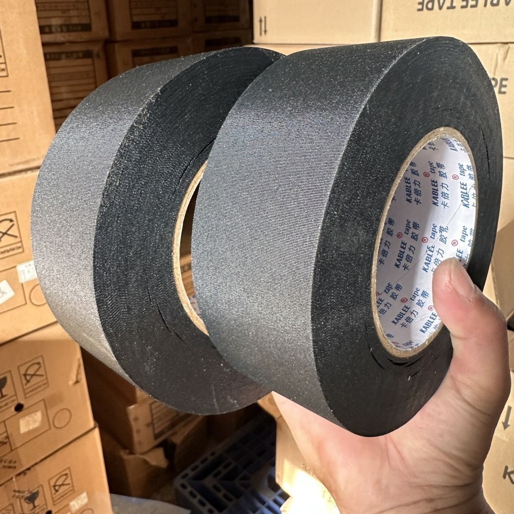 เทปผ้าโพลีเอสเตอร์ท่อทนต่อการสึกหรอเทปผ้าห่อเทปทนอุณหภูมิสูงสายรัดลวดทนต่อการสึกหรอม้วนใหญ่เทปฉนวน