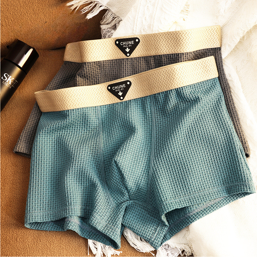 ผู้ชายผ้าไหมน้ําแข็งเย็นชุดชั้นในสไตล์ใหม่สีทึบกีฬากลางเอวขนาดใหญ่ระบายอากาศนักมวยเยาวชน ข6425