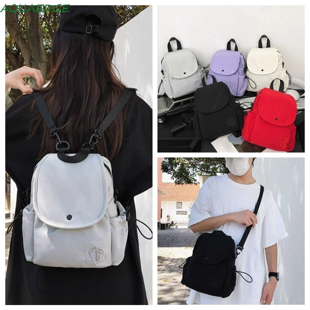 กระเป๋าเป้ไนลอน AQUAEDGE, กระเป๋านักเรียนวัยรุ่นสไตล์เกาหลีสีทึบ, กระเป๋านักเรียนลําลองความจุขนาดใหญ่มัลติฟังก์ชั่น Flip Sports Crossbody Bag Boys