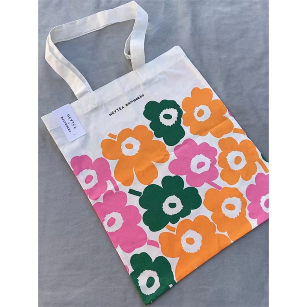 สินค้าใหม่ marimekko Finnish Xicha Co-Branded กระเป๋าผ้าใบบางไหล่เดียวแฟชั่นเป็นมิตรกับสิ่งแวดล้อมกระเป๋าช้อปปิ้งพับ