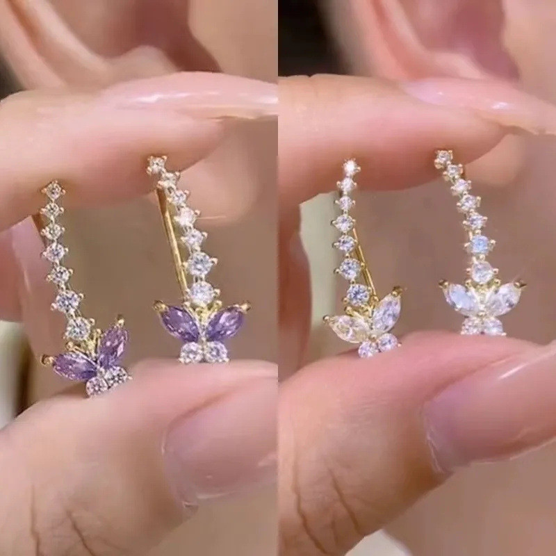 ซูเปอร์แฟลชสีม่วงเพทายผีเสื้อหูแถวต่างหูผู้หญิงต่างหูสตั๊ดที่สวยหรูระดับไฮเอนด์ส่วนบุคคลต่างหูขายส่งของขวัญ