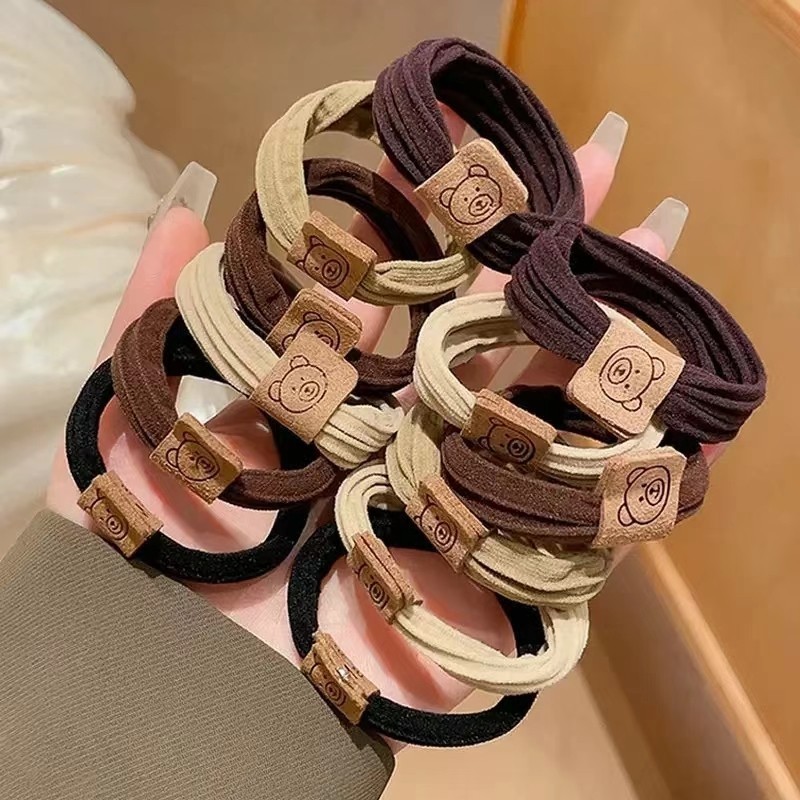 ยางรัดผมแบบหนาสวยงามและยางรัดผมลายหมีมีความทนทานและไม่ขาดง่าย ไม่ทำลายเส้นผม