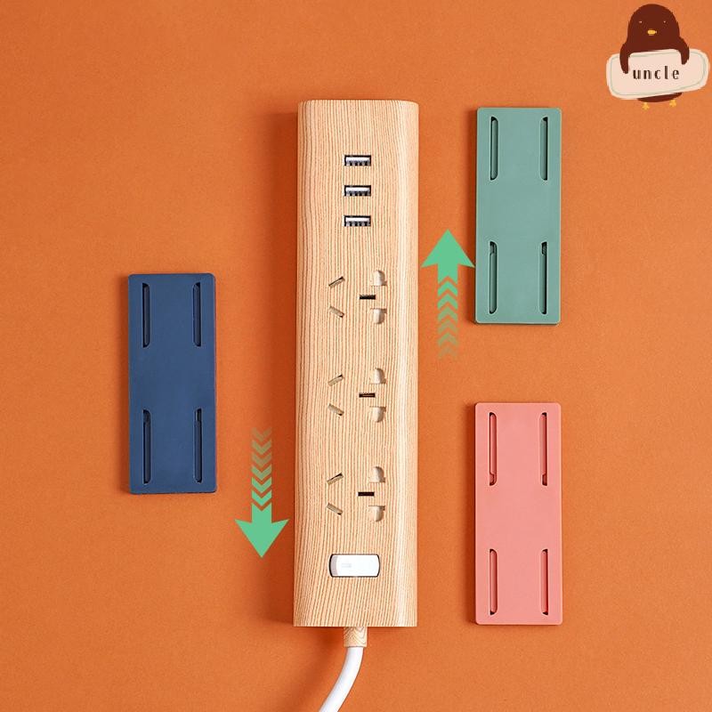 [UN] สติ๊กเกอร์ผู้ให้บริการปลั๊กติดผนัง Punch-free Home Self-Adhesive Socket Fixer Cable Wire Organizer Seamless Power Strip Holder TH