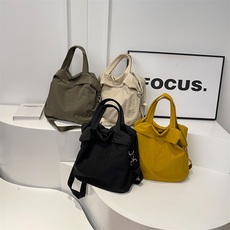 ผ้าใบความจุขนาดใหญ่ใหม่เกาหลีสีทึบ Tote