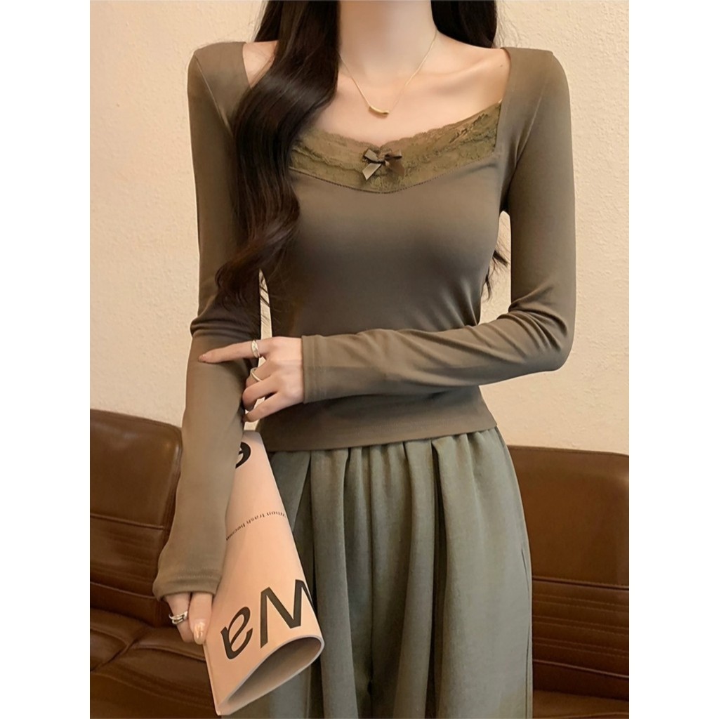 QY.Shop⭐️สินค้าราคาพิเศษ⭐️เสื้อแขนยาว คอกลมทรงรัดรูป ยืดกำลังดี มีฟองน้ำ แต่งโบว์จิ๋ว 