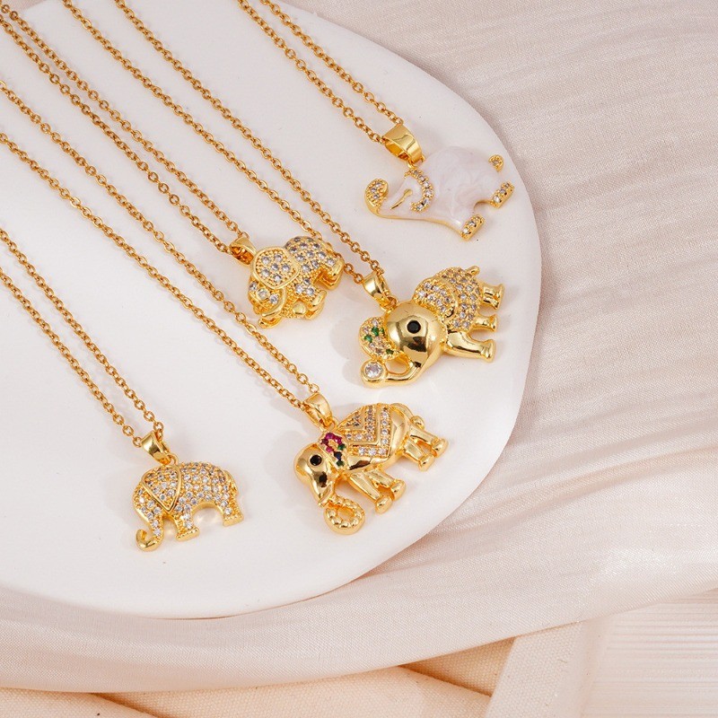 สร้อยคอมงคล dorado ลายพิมพ์มงคล ประดับพลอยเพทายชุบทองคำ 18K สร้อยคอเสริมความสวยงามและความหมายดี เป็นของขวัญวันสำคัญ