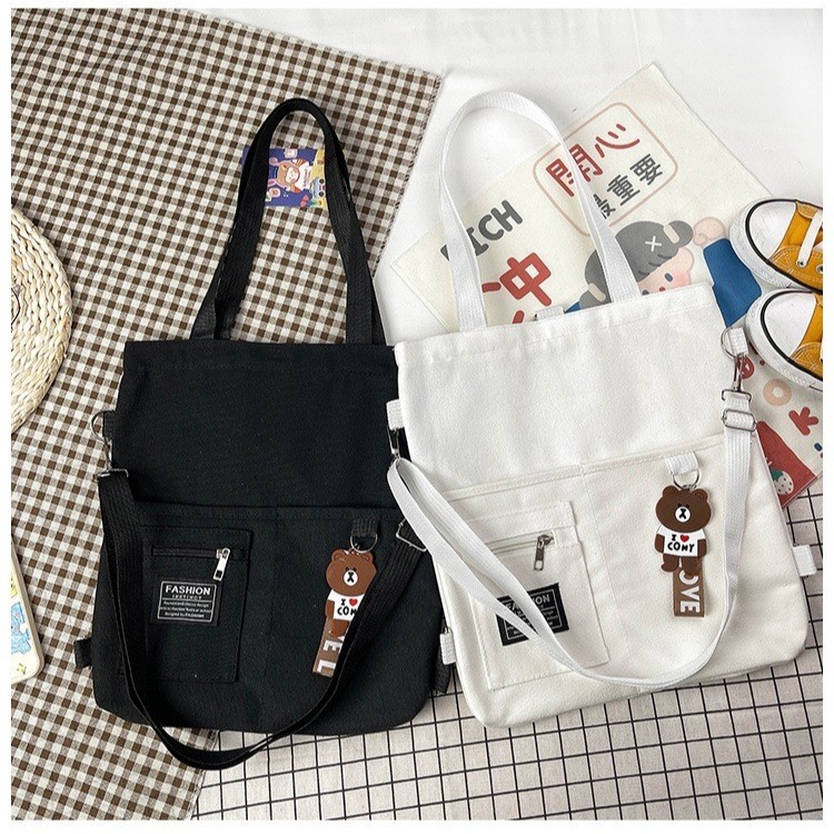 BM-shop2:  กระเป๋าผ้าแคนวาสมีซิปด้วยใส่ของได้เยอะนะผ้าแข็งแรง-มีพวงกุญแจแถมให้