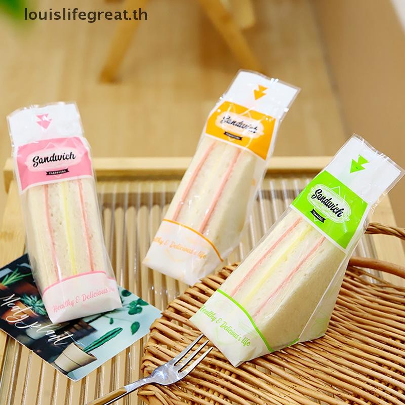 หลุยส์ไลฟ์เยี่ยมมาก 100 แพ็คของขนมปังบรรจุภัณฑ์แสงห่อแซนวิชพิเศษทิ้งง่ายต่อการฉีกขาดเค้กสามเหลี่ยมโปร่งใสอบถุงบรรจุภัณฑ์ขนมปังใ