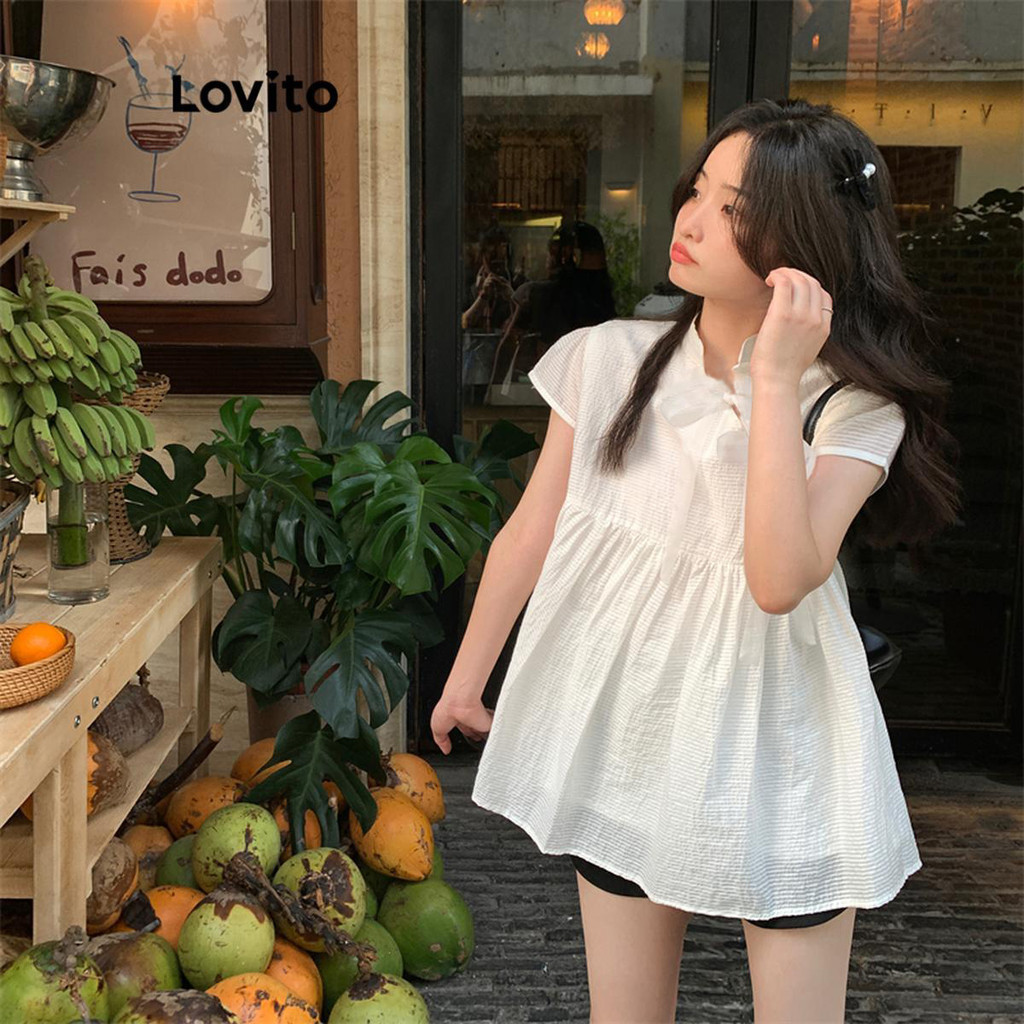 Lovito เสื้อเบลาส์ผู้หญิง แต่งโบว์ ผูกเชือก สีพื้น สไตล์ลำลอง LNA57024