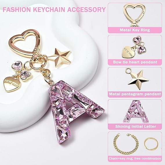 สีชมพูหวานคริสตัลเลื่อม AZ ตัวอักษรแหวนน่ารักโลหะ Star Bowknot แขวนพวงกุญแจกระเป๋ากุญแจรถ DIY จี้