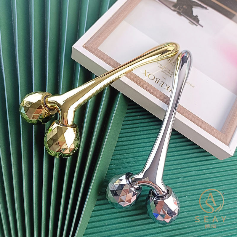Shiai ยี่ห้อ Face-lifting Handy เครื่องมือ 3D นวดความงามโลหะ Double Roller Shaping นวดความรู้สึกสามมิติ Eye กระเป๋ากําจัด 4.17