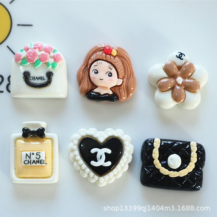 กระเป๋าขายส่งเครื่องประดับเรซินเงา อุปกรณ์ทำน้ำหอม DIY กาวครีม อุปกรณ์ทำผมทำมือ วัสดุสติ๊กเกอร์สีดำและขาว