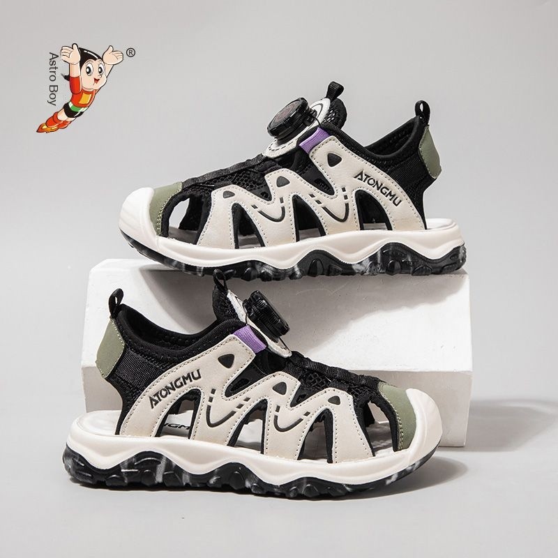 Astro Boy รองเท้าแตะนิ้วเท้าสำหรับเด็กกลางและใหญ่สำหรับฤดูร้อน/ปุ่มหมุน/กันลื่น/รองเท้าชายหาดกีฬาพื้