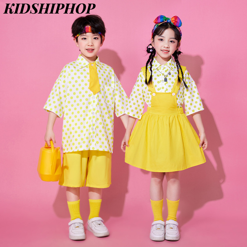 ชุดเสื้อลายจุดสีเหลืองเด็กผู้ชายสาวน่ารักกระโปรงสายรัดเด็กเต้นรําประสิทธิภาพเครื่องแต่งกายถ่ายภาพจบการศึกษาเด็กวิทยาเขตสไตล์สบายและนุ่มเสื้
