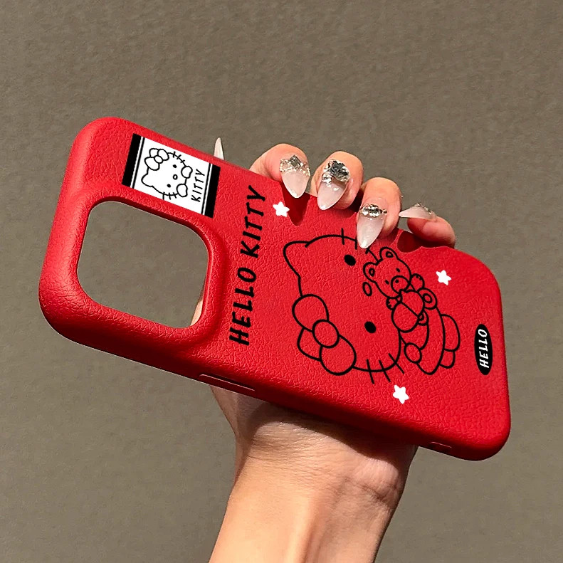 Huiwanju สีแดง kt ที่ใช้งานได้ iPhone16 เคสโทรศัพท์มือถือหญิง ip16promax ความรู้สึกขั้นสูง 15plus ฤดูใบไม้ร่วงและฤดูหนาว lambskin 14 การ์ตูน 13 น่ารัก 12 สร้างสรรค์นุ่ม 11 เคสป้องกัน