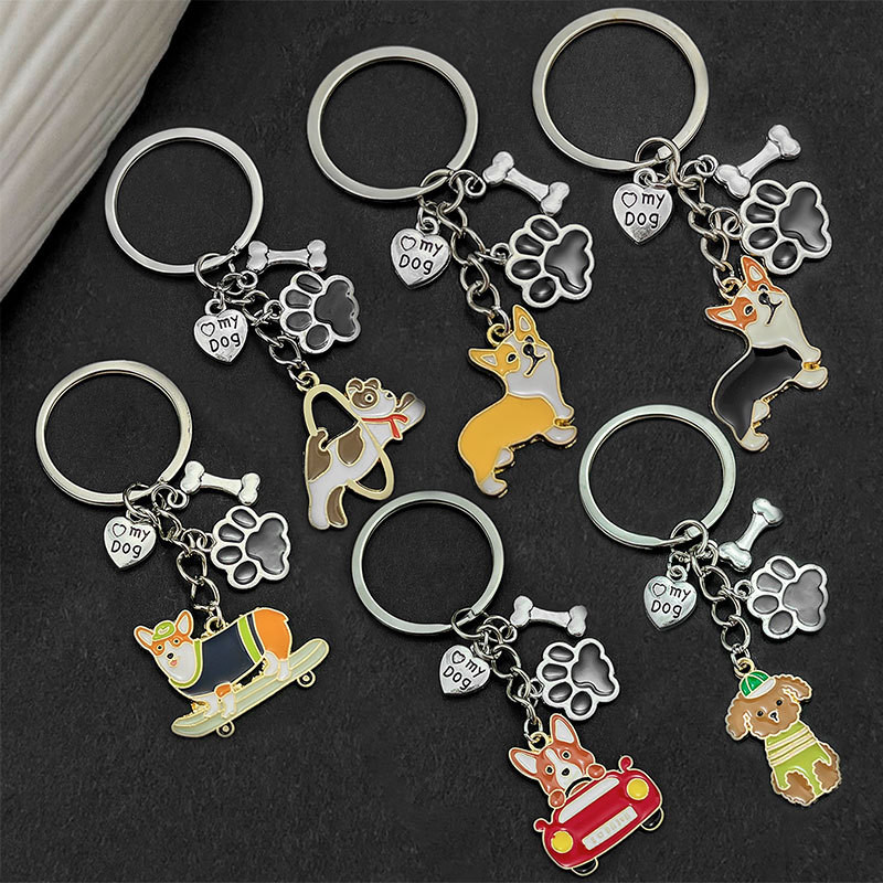 Kawaii โลหะลูกสุนัขพวงกุญแจ Creative Cartton สเก็ตบอร์ดไดรฟ์สุนัขพวงกุญแจ Paw Bone Pendnats สัตว์เลี้ยงคนรักของขวัญ