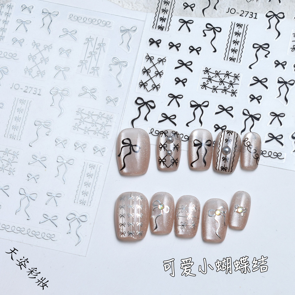 ฝรั่งเศสริบบิ้นโบว์เล็บสติ๊กเกอร์สไตล์ใหม่สีดําสีขาวสีชมพูสีฟ้าทองสายเงินกาวเล็บสติ๊กเกอร์