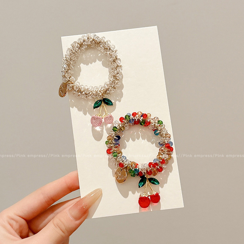 2025 ประณีตที่มีสีสันคริสตัลเชือกผมสร้อยข้อมือสําหรับสองอุปกรณ์ผมและผมวงกลมสําหรับผู้หญิงเชอร์รี่บุคลิกภาพยางรัดผูกผมหางม้าคาดศ