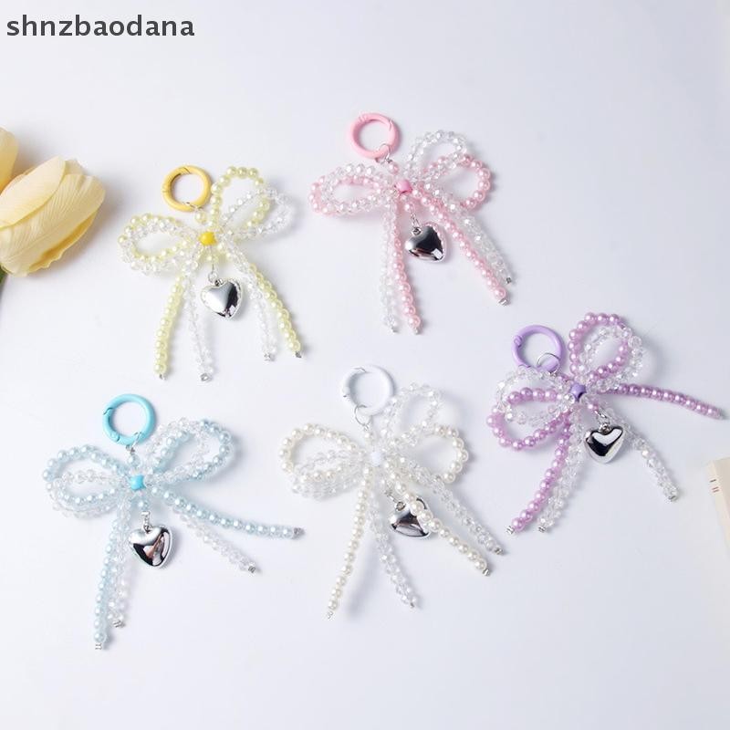 [SHNZAA] 1pc Handmade Pearl คริสตัลโบว์คู่รูปจี้พวงกุญแจเครื่องประดับลูกปัดที่ละเอียดอ่อนพวงกุญแจ DIY ตกแต่งสําหรับกระเป๋าโทรศัพท์ FSSG
