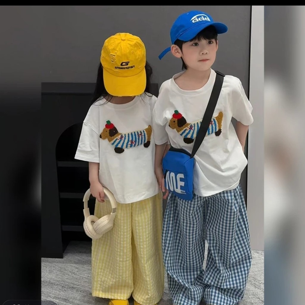 ฤดูร้อนเกาหลีรุ่นการ์ตูนแขนสั้นเสื้อยืดกางเกงลายสก๊อตสูทแฟชั่นเด็กหลวมฤดูร้อนขนาดกลางขนาดใหญ่เสื้อผ้าเด็ก