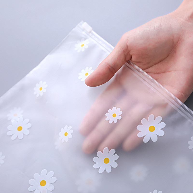 ถุงซิปใส่เสื้อผ้าลายดอกเดซี่  ถุงเก็บของเดินทาง บรรจุเสื้อผ้า ถุงบรรจุภัณฑ์พลาสติกPE พร่อมส่ง - รูปที่ 5