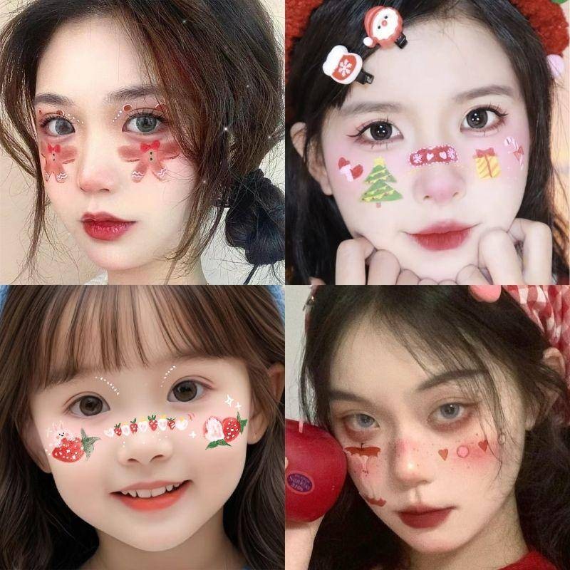 คริสต์มาสเด็กแต่งหน้าสติกเกอร์หิมะดอกไม้สติกเกอร์รอยสักสตรอเบอร์รี่ต้นคริสต์มาสสติกเกอร์ใบหน้าน่ารักกวางรักแป้งบลัชออน