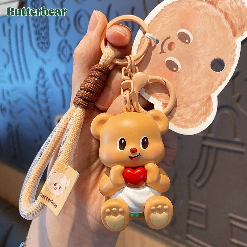 [Aria] ของแท้อินเทรนด์เนยหมีพวงกุญแจผู้หญิงการ์ตูนน่ารักประณีตตุ๊กตาฉีดพวงกุญแจจี้กระเป๋า