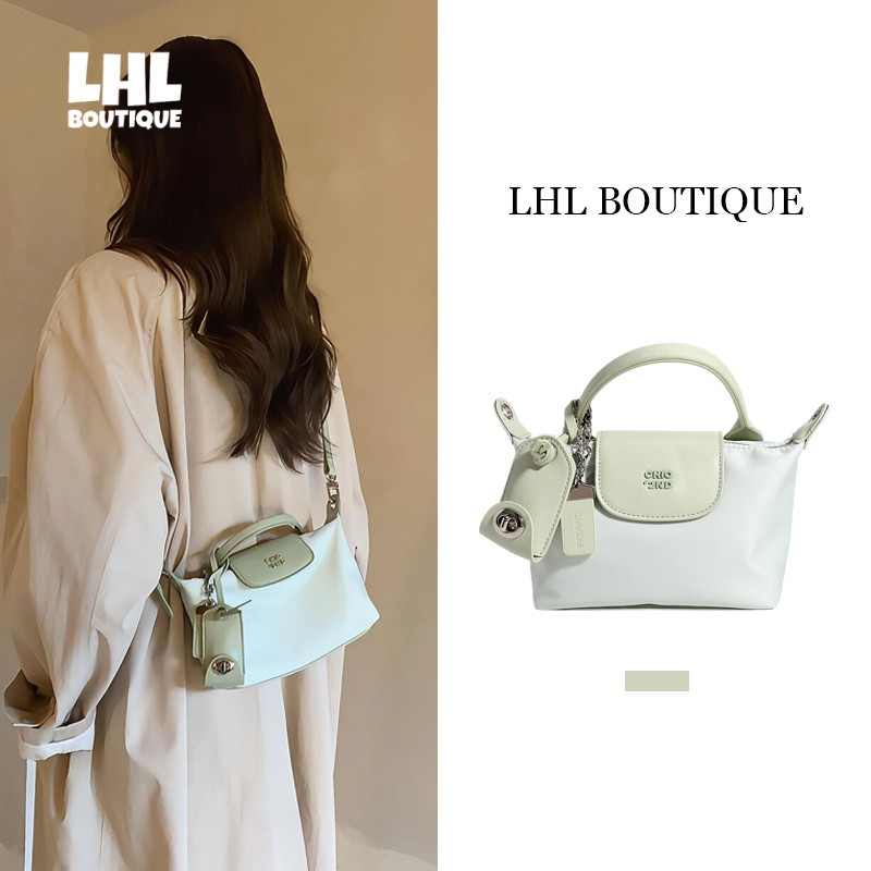 LHL BOUTIQUE กระเป๋าเดินทางมาการองกระเป๋าสะพายไหล่แนวทแยงเรียบง่าย