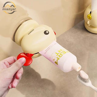 😍COD😍เครื่องบีบยาสีฟันแบบหมุนด้วยมือรูปปลาทองน่ารัก-ถ้วยดูดแบบพกพาคงที่ที่ใส่ยาสีฟันกันลื่น