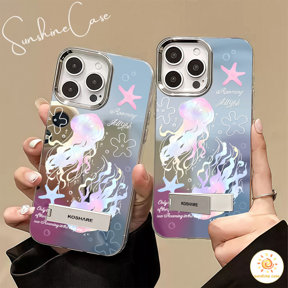 จัดส่งทันที เคสมือถือ แมงกะพรุนสีชมพูฟ้า เคสกระจกเงาขาตั้งใช้กับIPhone13 12 11 16 15 14 Pro PROMAX 7/8PLUS X XR XS XSMAX