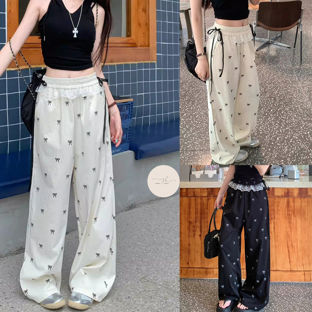 กางเกงขายาวทรงหลวมแต่งโบว์ลูกไม้ สวมใส่สบาย
