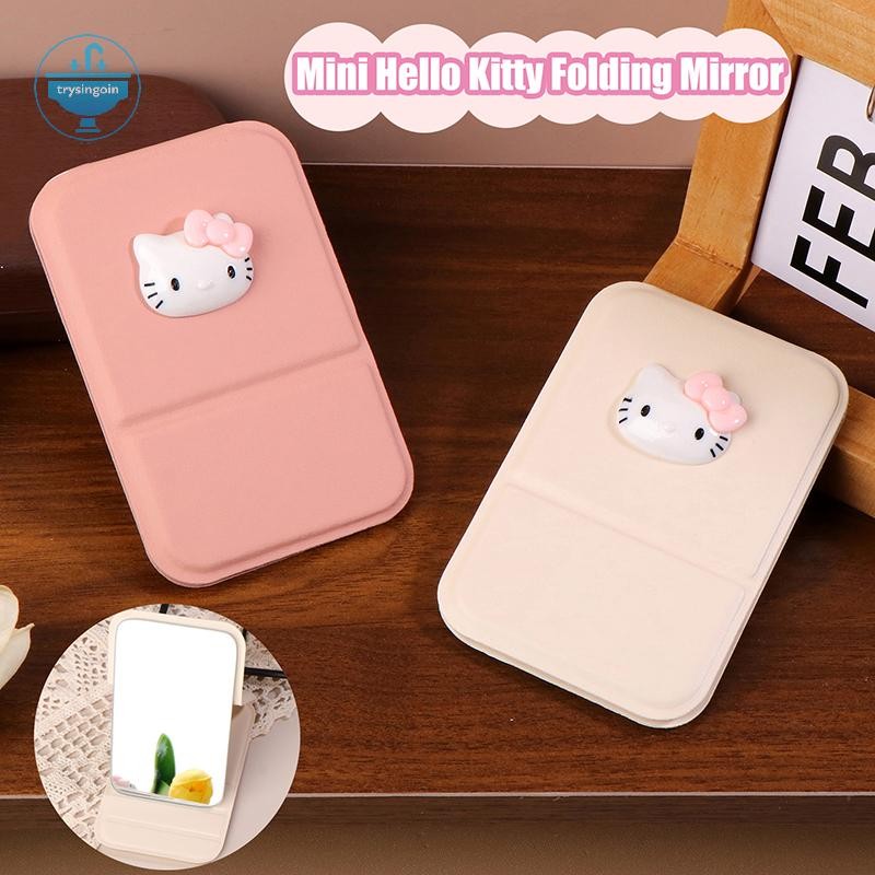 [trysingoin] Kawaii Hello Kitty กระจกพับ Sanrio KT Cat กระจกแต่งหน้าแบบพกพากระจกตั้งโต๊ะของขวัญ TH