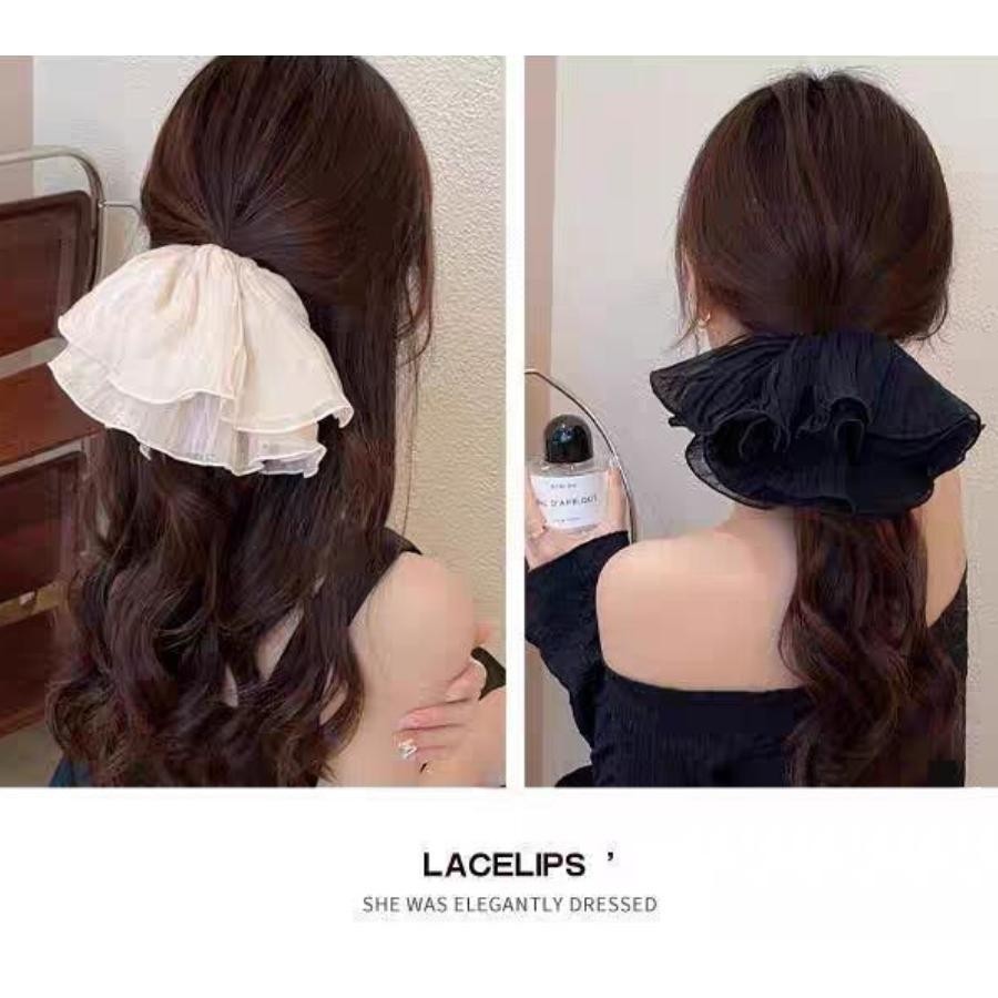 แฟชั่นแถบคาดศีรษะจีบความรู้สึกระดับไฮเอนด์ที่คาดผมสีดําและสีขาวดอกไม้อเนกประสงค์เครื่องประดับผมยางรัดผมแบบเรียบง่ายสําหรับผู้หญิง