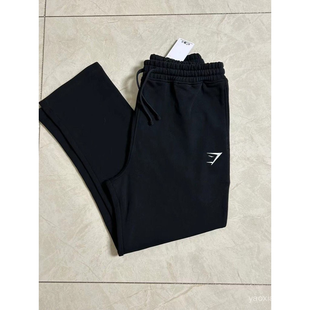 Gymshark Crest กางเกงผู้ชายกีฬาลำลองฤดูใบไม้ผลิและฤดูใบไม้ร่วงทรงหลวมผ้าฝ้ายทรงตรงกางเกงสีล้วน