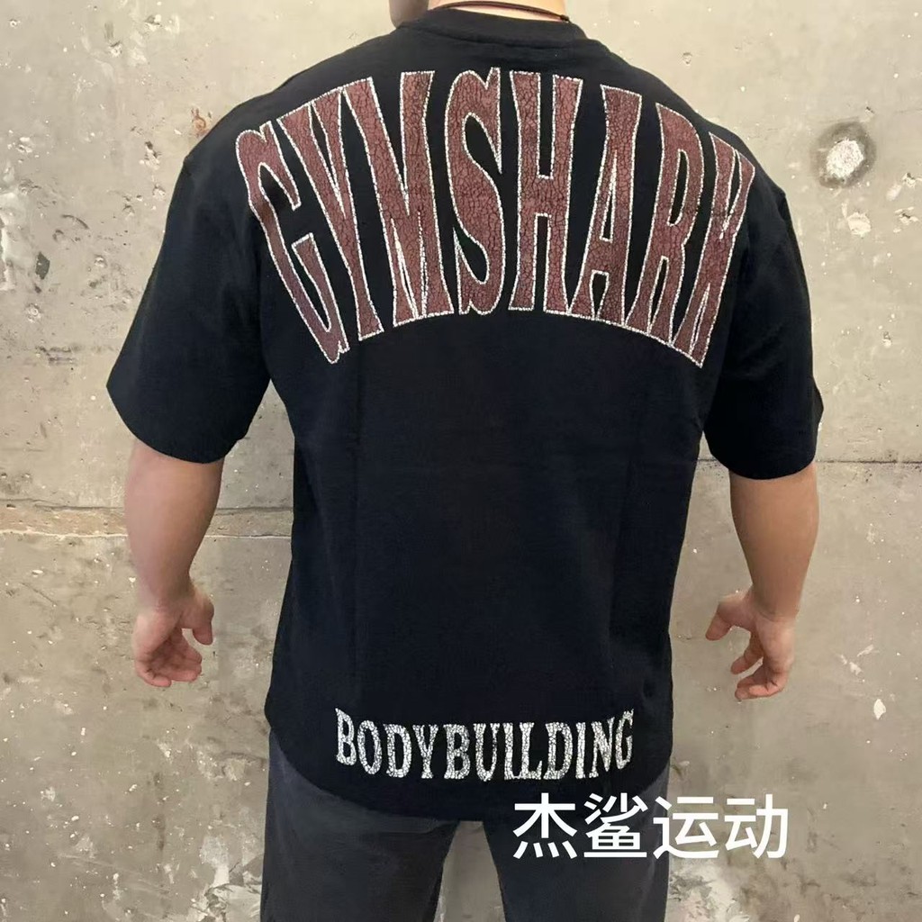 Gymshark Bodybuilding Graphic เสื้อยืดแขนสั้นผู้ชายอินเทรนด์อินเทรนด์