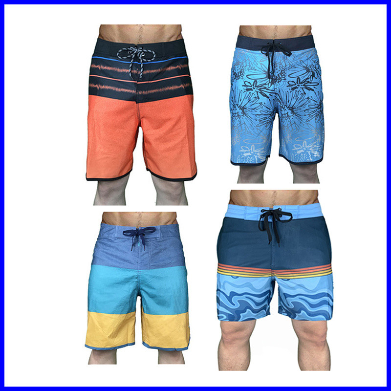 QUIKSILVER กางเกงขาสั้นผู้ชาย แห้งเร็ว สไตล์หลวม เหมาะสำหรับชายหาดและกิจกรรมกลางแจ้ง