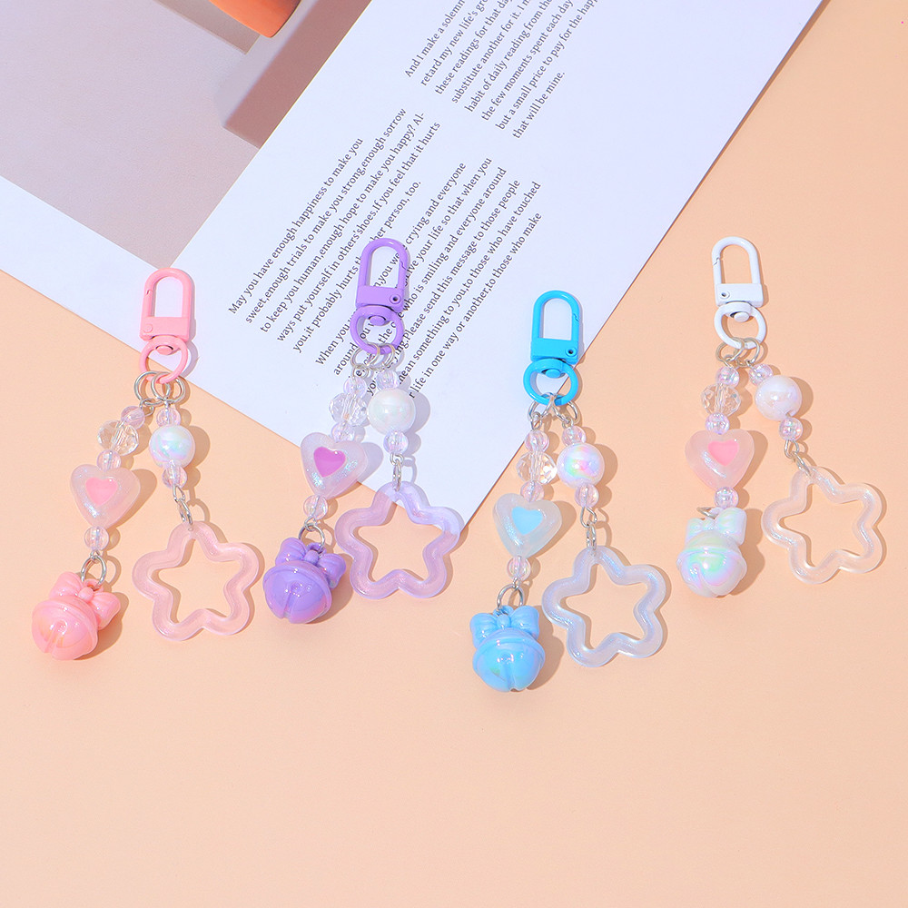 น่ารักอะคริลิค Hollow Star Key แหวนน่ารัก Bell รูปหัวใจจี้ Key Chains หูฟังเครื่องประดับ
