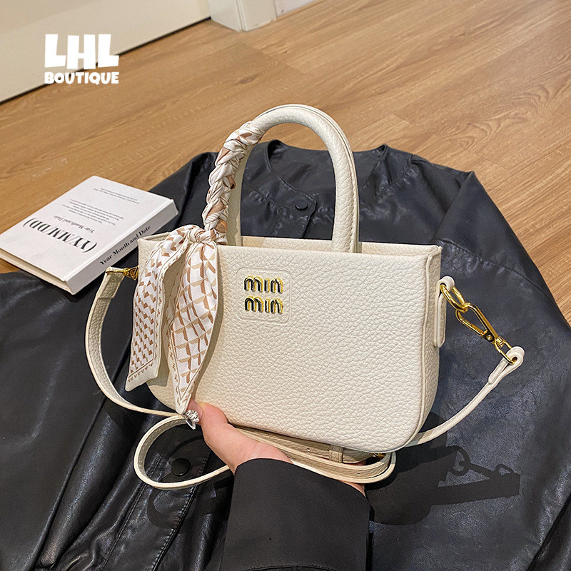 LHL BOUTIQUE Popular high-end กระเป๋าถือผู้หญิงใหม่กระเป๋าสะพายไหล่แบบพกพาที่เรียบง่าย
