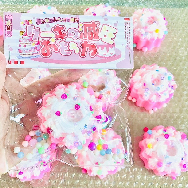 สกุชชี่น้ําตาล เค้กวันเกิดสีชมพู ทาบา สกุชชี่ ของเล่นซิลิโคน