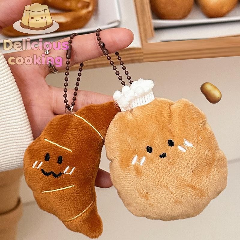 [ทําอาหารอร่อย] 1ชิ้น น่ารัก ครัวซองต์จี้ขนมปังตุ๊กตาตุ๊กตาพวงกุญแจน่ารักมะเขือเทศอาหารตุ๊กตาพวงกุญแจสําหรับกระเป๋าตกแต่งกุญแจรถอุปกรณ์ [ใหม่]