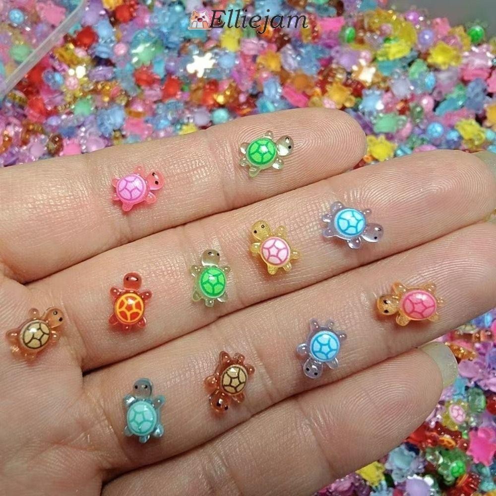 ELLIEJAM 100 ชิ้นเต่าเรืองแสง, การ์ตูน DIY Mini เรซิ่นสัตว์, น่ารัก Night Glow Dopamine สี Mini Turtle Nail Charms ตกแต่งสวนนางฟ้า