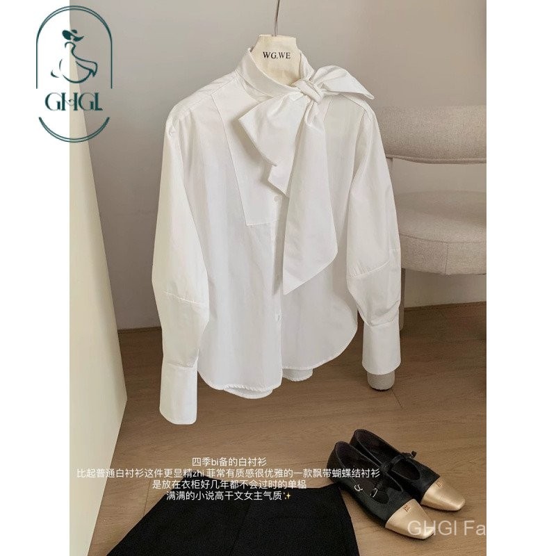 Ghgl❤️ เสื้อเชิ้ตสีขาวลายโบว์สตรีสตรีสไตล์อังกฤษที่สง่างามเสื้อเชิ้ตแขนยาวทรงหลวมใส่แล้วดูผอมเพรียว
