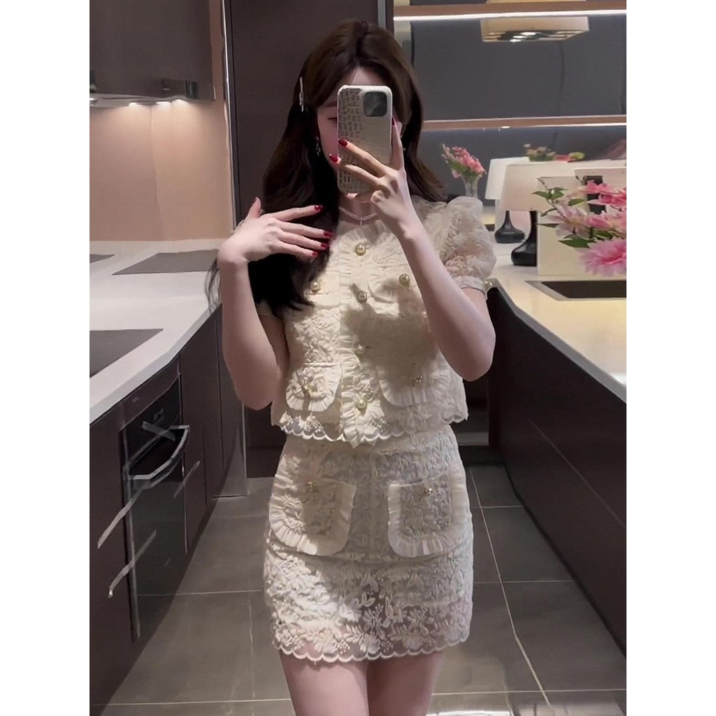ชุดสูทผู้หญิงฤดูร้อนสไตล์ใหม่อารมณ์ระดับไฮเอนด์แสงหรูหราสลิมฟิตลูกไม้ด้านบน + กระโปรง