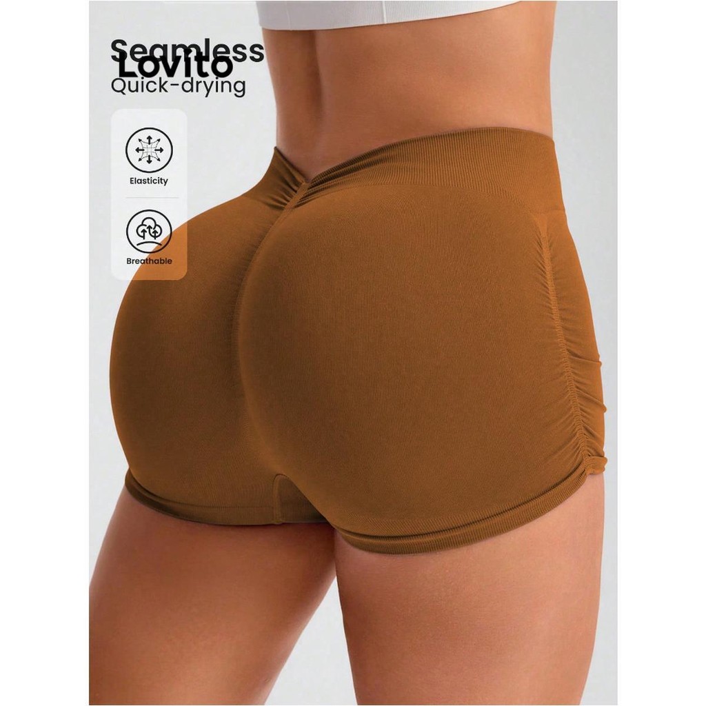 Lovito กางเกงขาสั้นสปอร์ตสีพื้นล้วนสำหรับผู้หญิง LNL89045