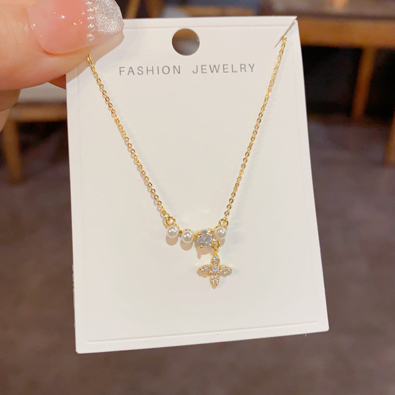 แสงหรูหราแฟชั่นมุกแฉกดาวพู่อารมณ์ที่เรียบง่ายระดับไฮเอนด์สร้อยคอโซ่กระดูกไหปลาร้าทั้ง - รูปที่ 2