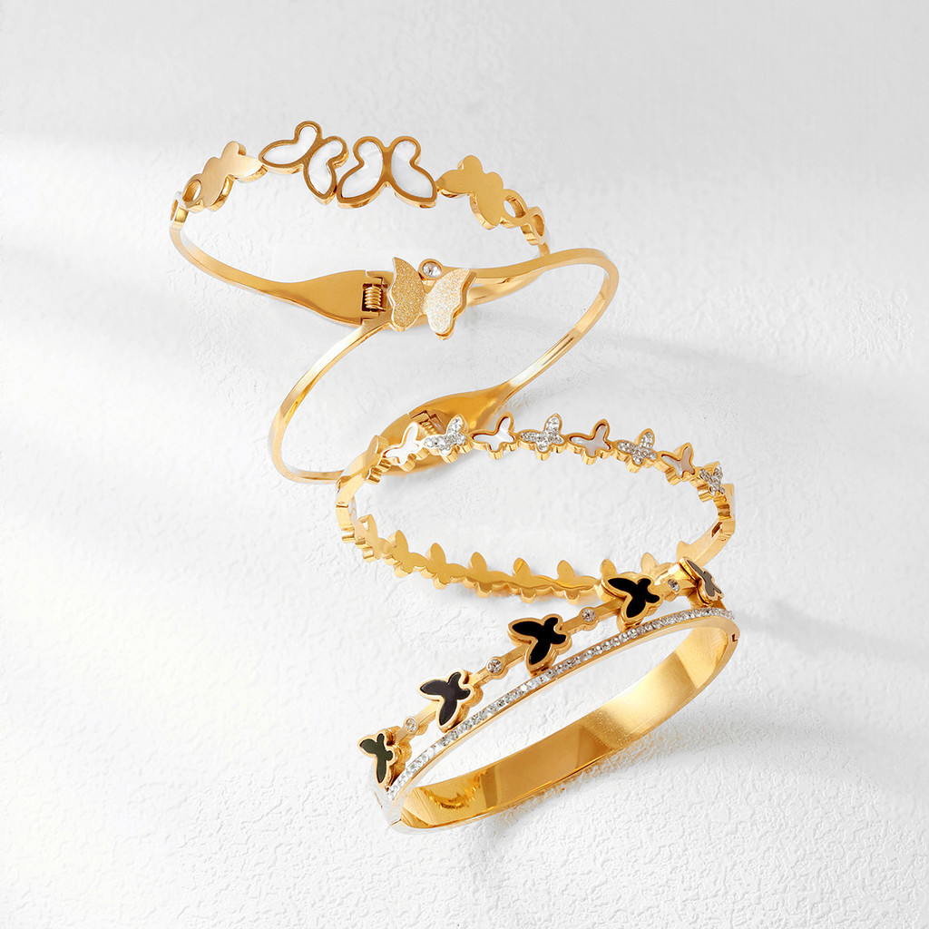 สามhigh-endผีเสื้อผู้หญิงnon-fadeเครื่องประดับมือยุโรปอเมริกันgold-platedสร้อยข้อมือเหล็กไทเทเนียมต้องมีสําหรับของขวัญ
