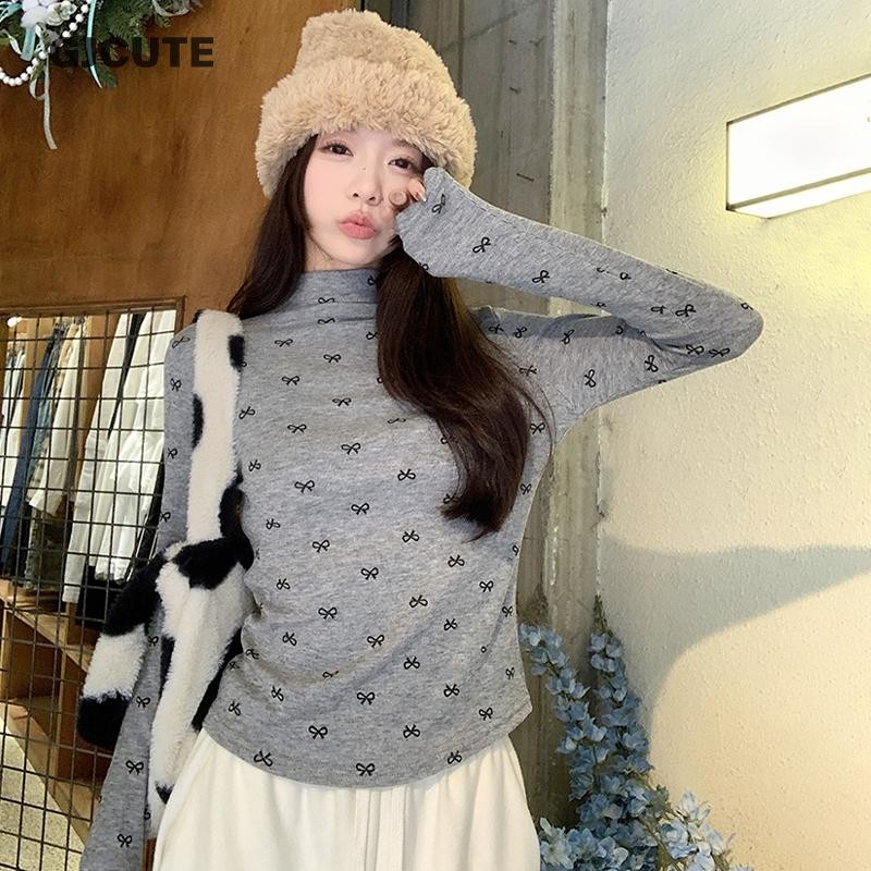 Gjcute ฤดูใบไม้ร่วงฤดูหนาวเกาหลีโบว์หวานพิมพ์ครึ่งคอเต่าแขนยาวเสื้อยืดบางสําหรับผู้หญิง WTD