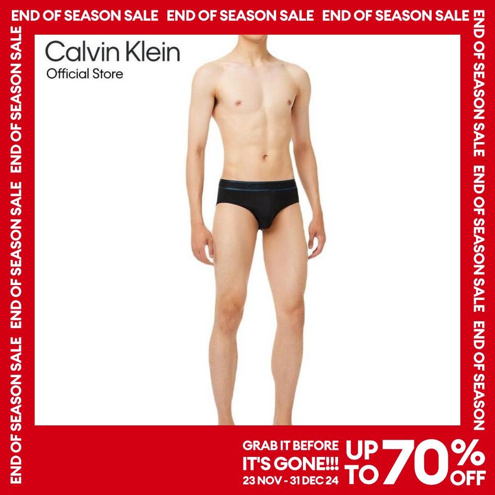 CALVIN KLEIN กางเกงในชาย Tonal Logo Micro ทรง Hip Brief รุ่น NB4054 UB1 - สีดำ