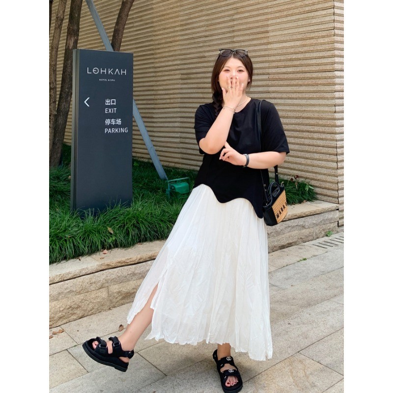 COCO-เสื้อยืดสตรี แขนสั้น ผิดปกติ ประเภทรุ่นหลวม หวาน อารมณ์ แฟชั่นสบาย ๆ เวอร์ชั่นเกาหลี ขนาดพลัส - รูปที่ 2