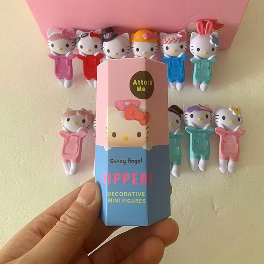 1 ชิ้นสุ่ม Hello KITTY HIPPERS series สามารถติดกาวเพื่อวัตถุในชีวิตประจําวัน อุปกรณ์เสริมโทรศัพท์มือถือน่ารัก